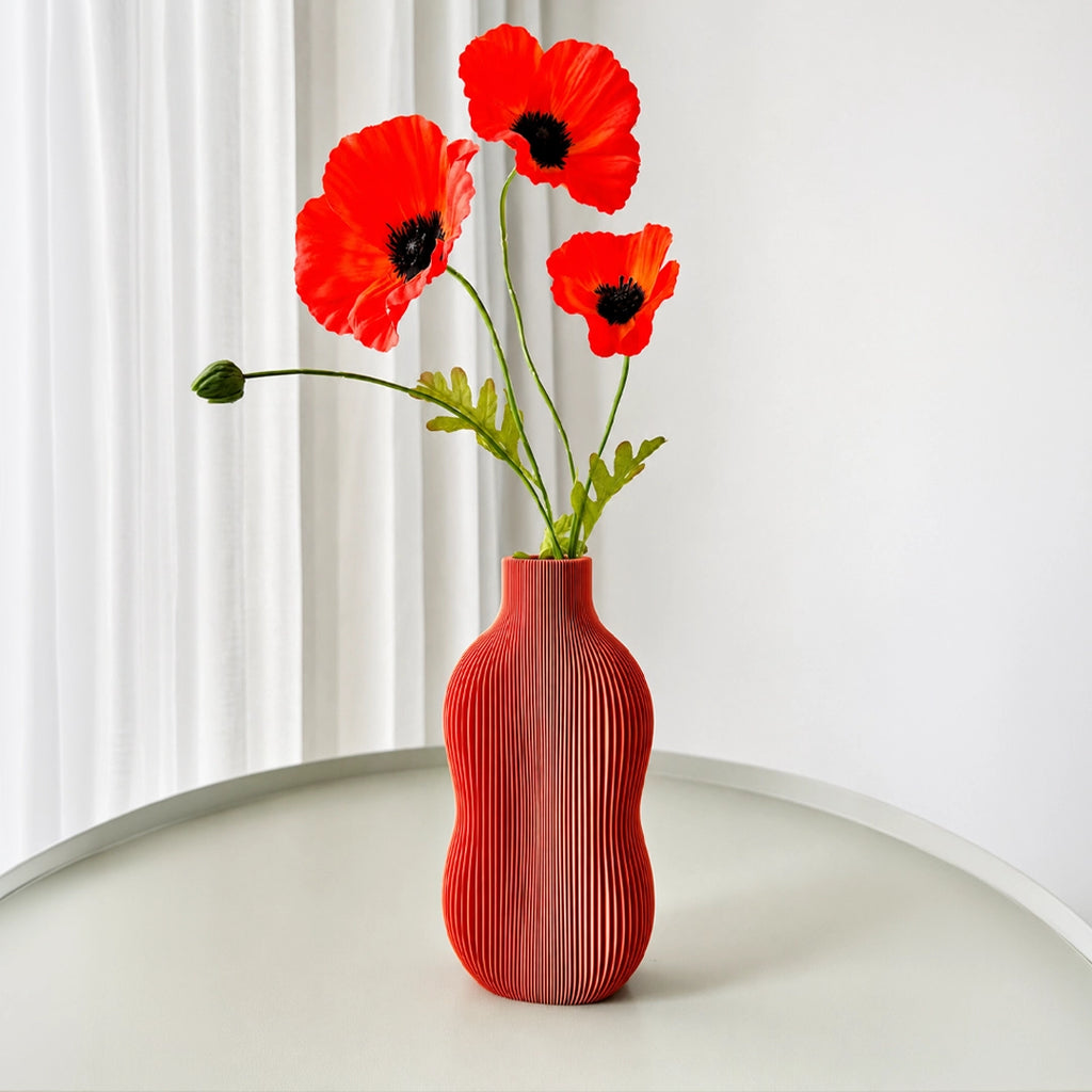 Wavey Vase – Elevate your space with this modern decorative vase featuring elegant wavy contours and artistic design. Perfect for fresh flowers, dried arrangements, or as a stylish standalone home décor accent.