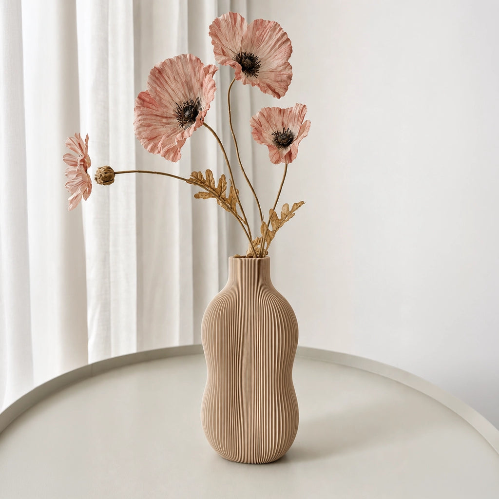 Wavey Vase – Elevate your space with this modern decorative vase featuring elegant wavy contours and artistic design. Perfect for fresh flowers, dried arrangements, or as a stylish standalone home décor accent.