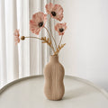 Wavey Vase – Elevate your space with this modern decorative vase featuring elegant wavy contours and artistic design. Perfect for fresh flowers, dried arrangements, or as a stylish standalone home décor accent.