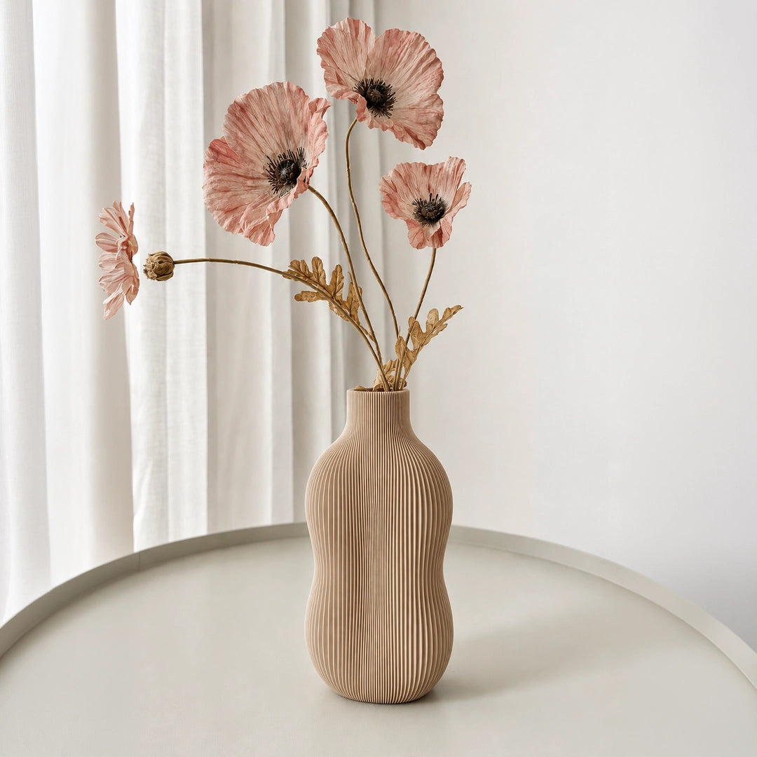 Wavey Vase – Elevate your space with this modern decorative vase featuring elegant wavy contours and artistic design. Perfect for fresh flowers, dried arrangements, or as a stylish standalone home décor accent.